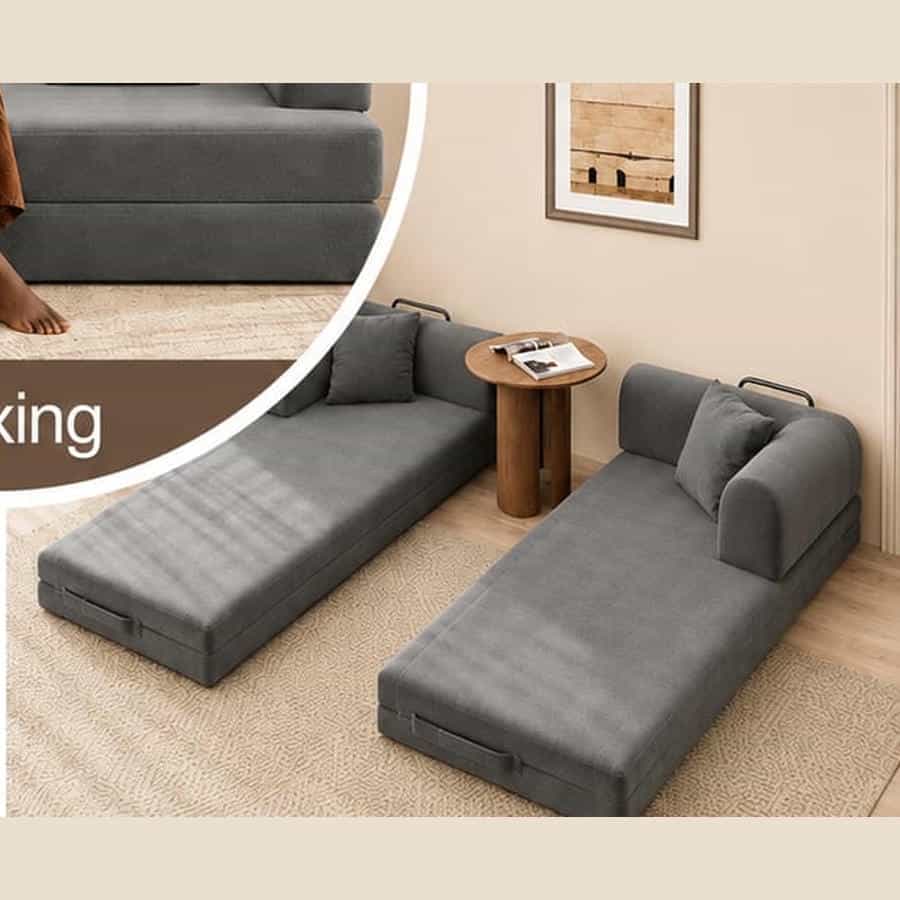 Friends chatting together on a sofa bed